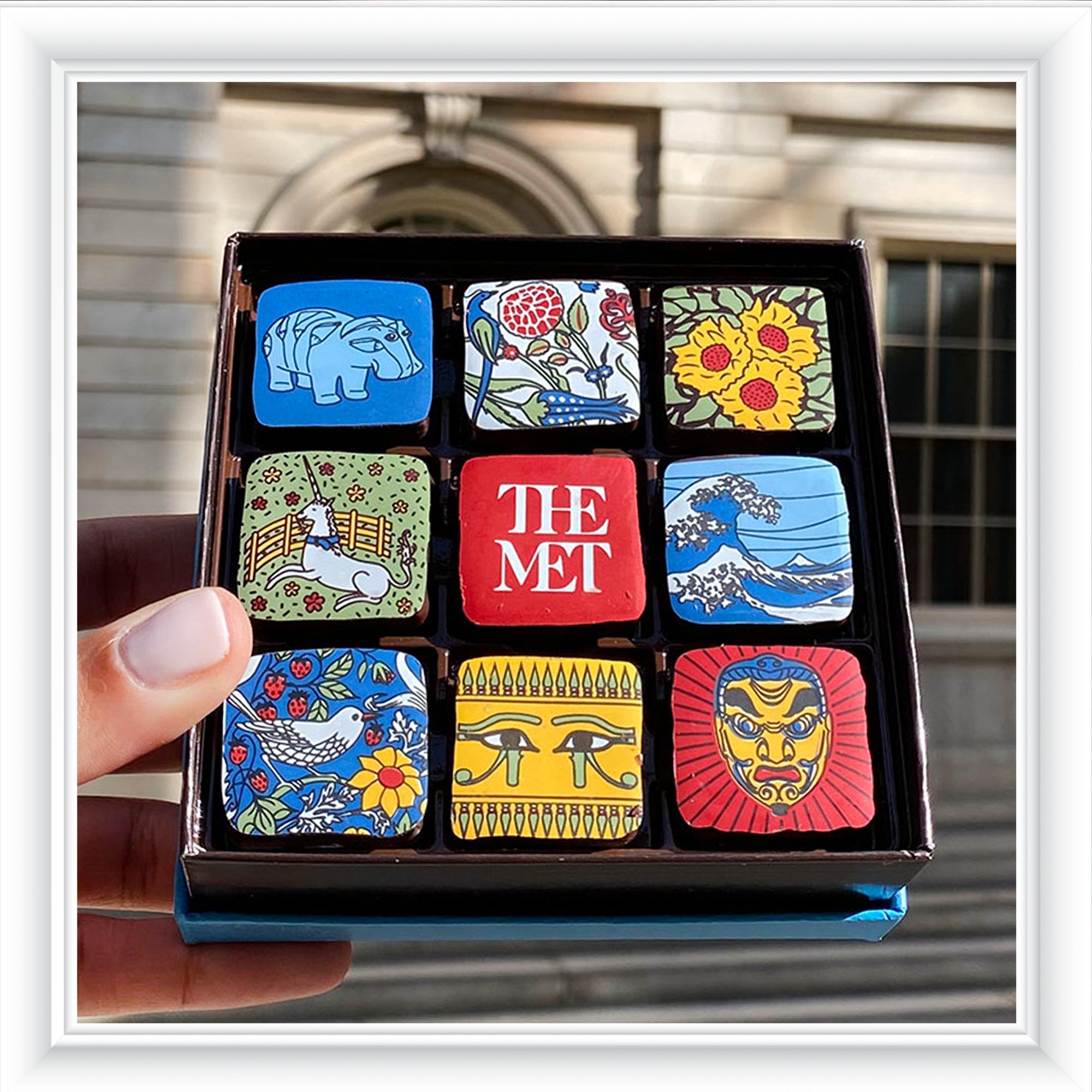 Clients Sharing MarieBelle Chocolates: The Met