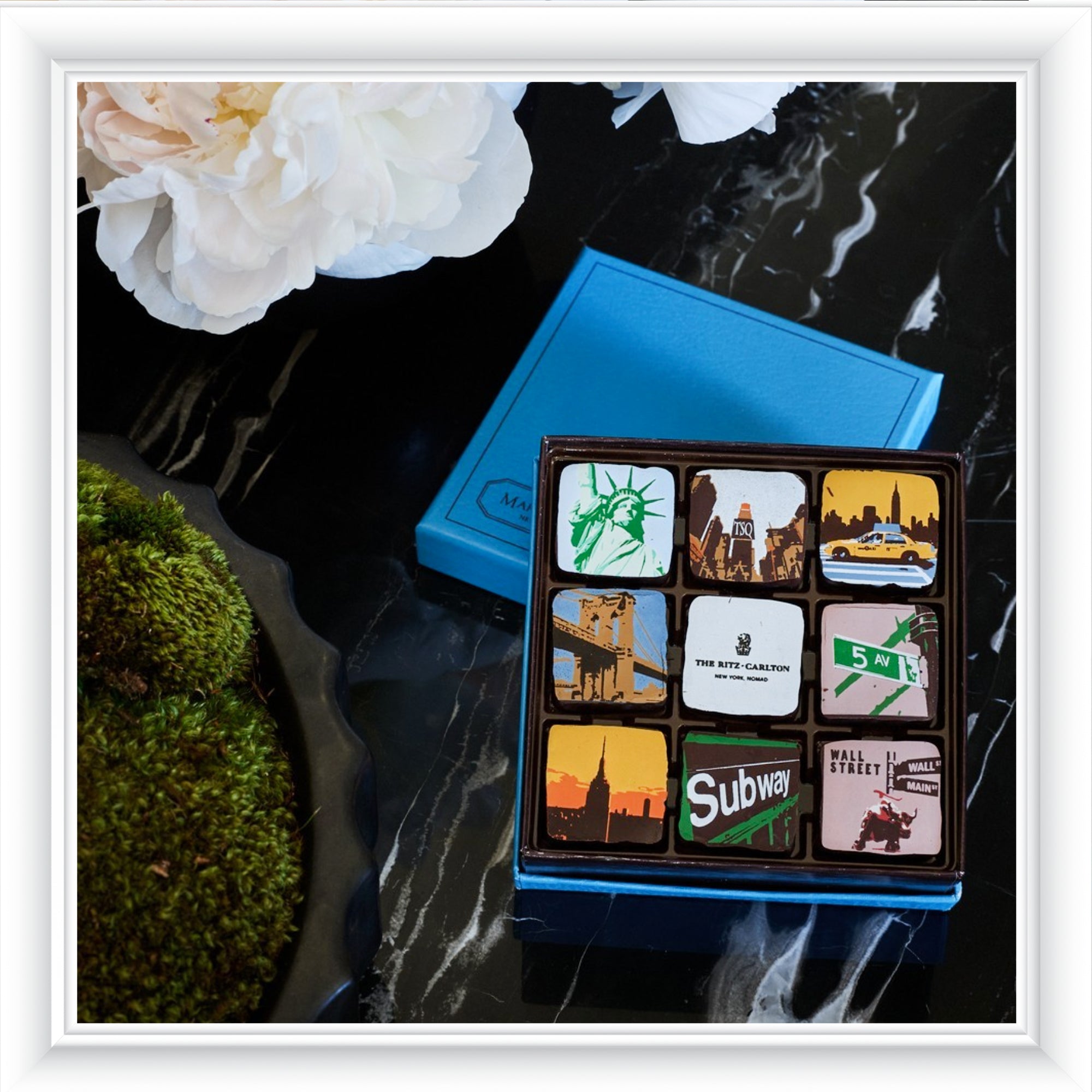 Clients Sharing MarieBelle Chocolates: The Ritz Carlton