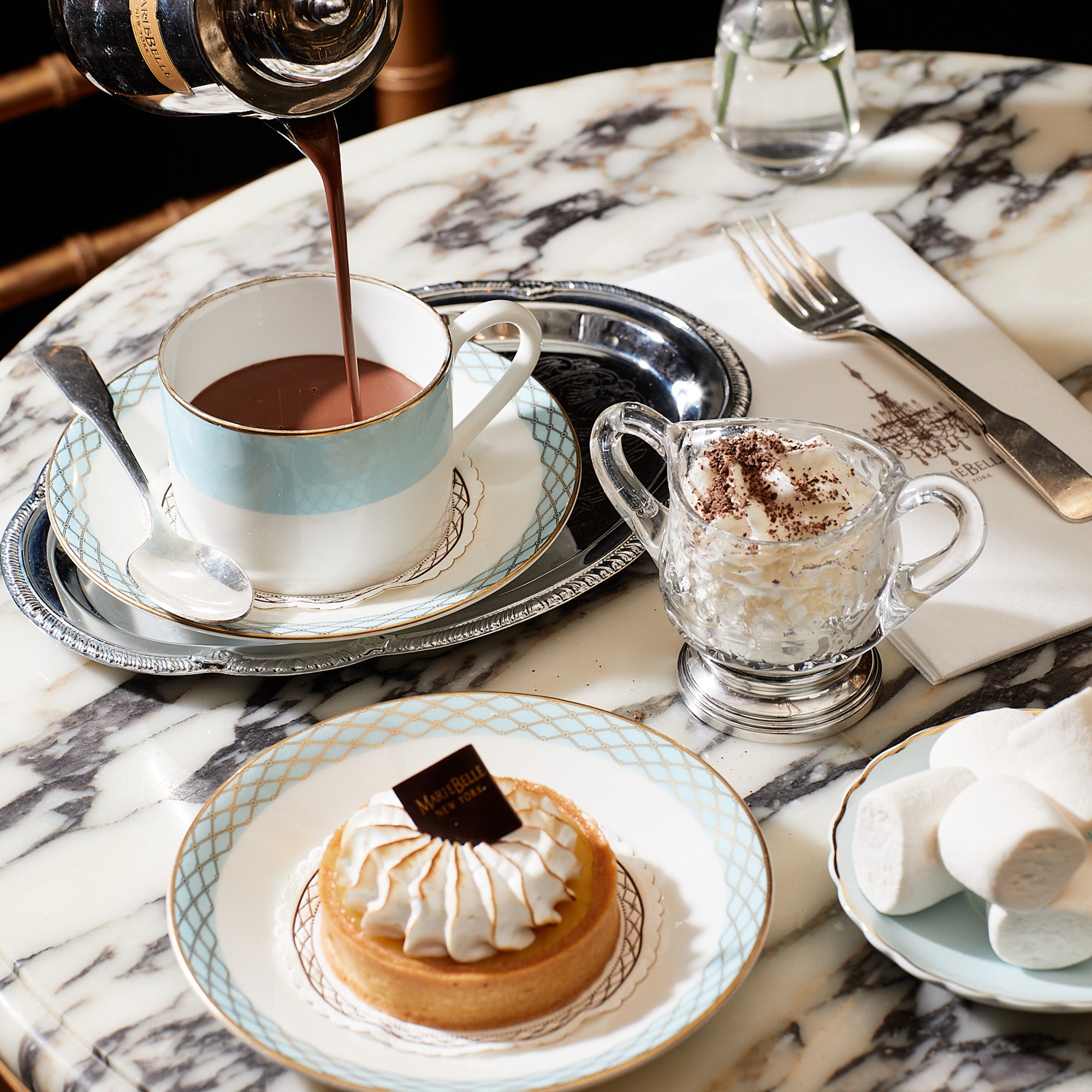 Milk Chocolate and Hazelnut Hot Chocolate Being Poured